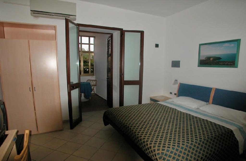 Lampedusa Hotel Pokoj fotografie